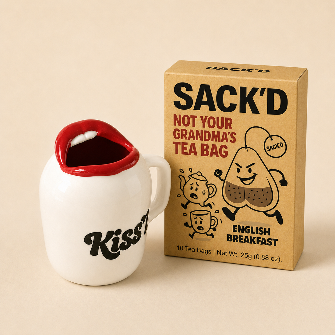 KISS'D white ceramic lip mug beside a SACK'D English Breakfast tea box